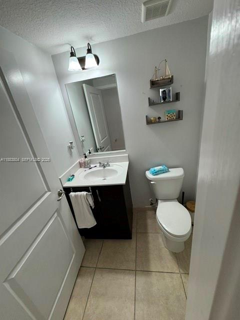 22509 Southwest 102nd Avenue Miami, FL 33190 - Photo 33 of 39 a bathroom with a toilet sink and mirror