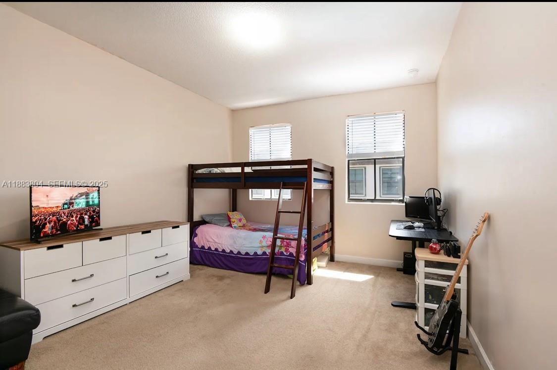 22509 Southwest 102nd Avenue Miami, FL 33190 - Photo 35 of 39 a bedroom with furniture and window