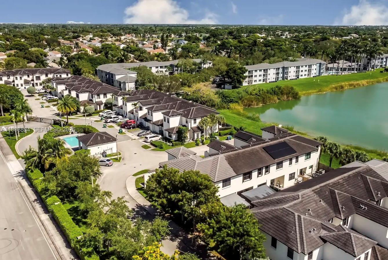 22509 Southwest 102nd Avenue Miami, FL 33190 - Photo 5 of 39 an aerial view of residential houses with outdoor space