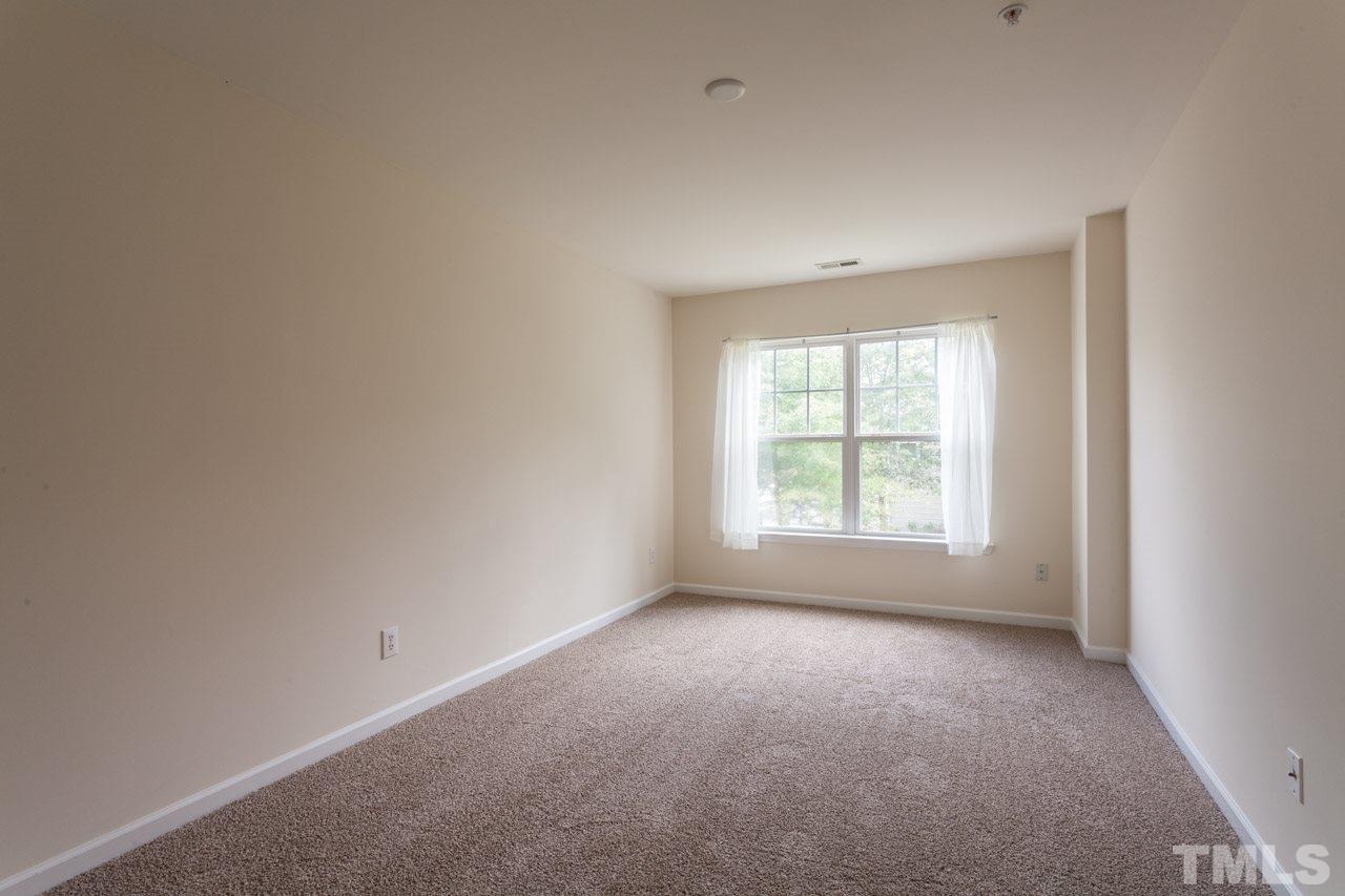 8631 Neuse Club Lane, Unit 100 Raleigh, NC 27616 - Photo 25 of 25 a view of room and window