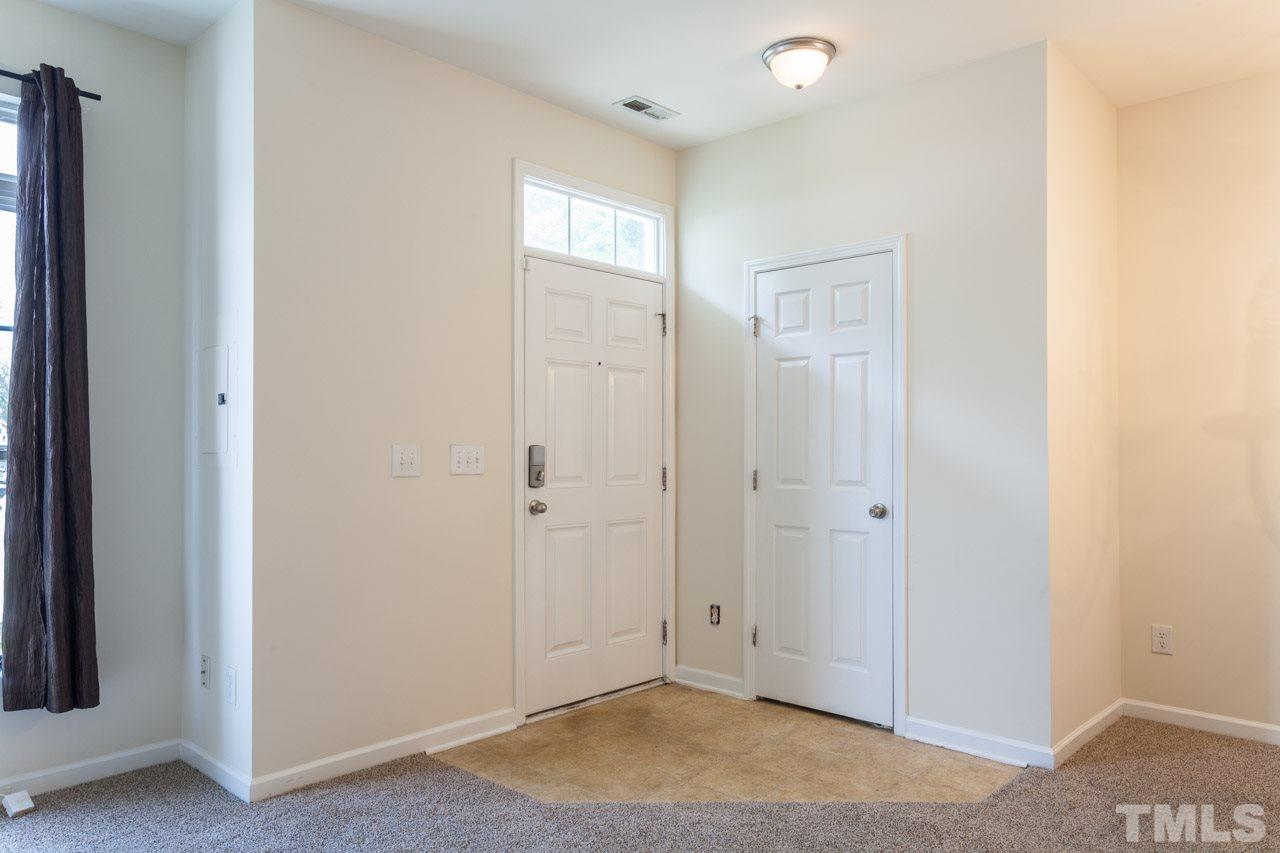 8631 Neuse Club Lane, Unit 100 Raleigh, NC 27616 - Photo 4 of 25 a view of an empty room
