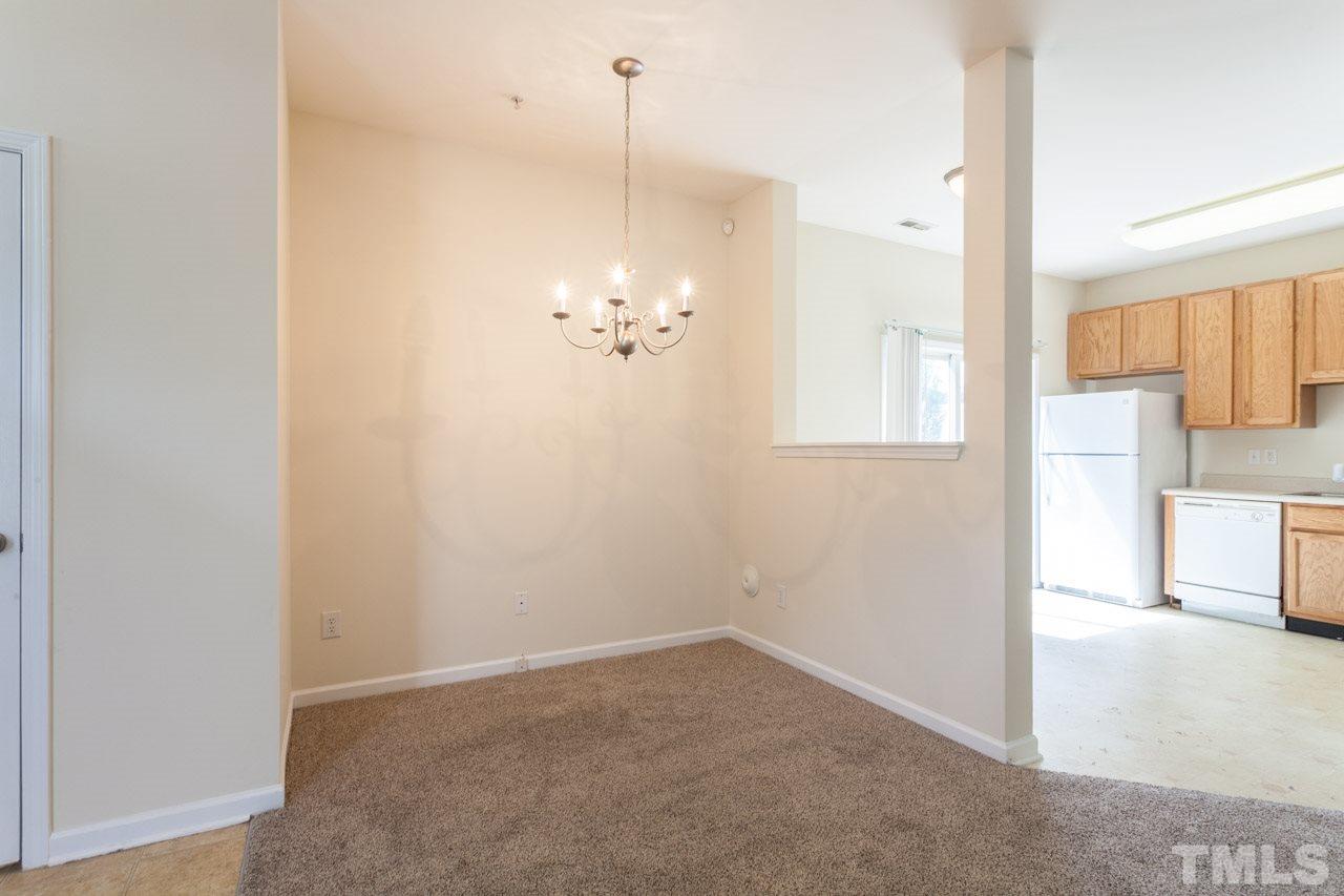 8631 Neuse Club Lane, Unit 100 Raleigh, NC 27616 - Photo 9 of 25 a view of a room with an entryway