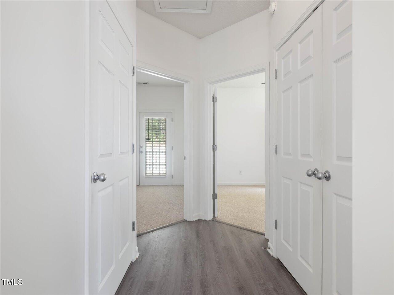 522 Auburn Square Drive Durham, NC 27713 - Photo 20 of 47 a view of a hallway with wooden floor