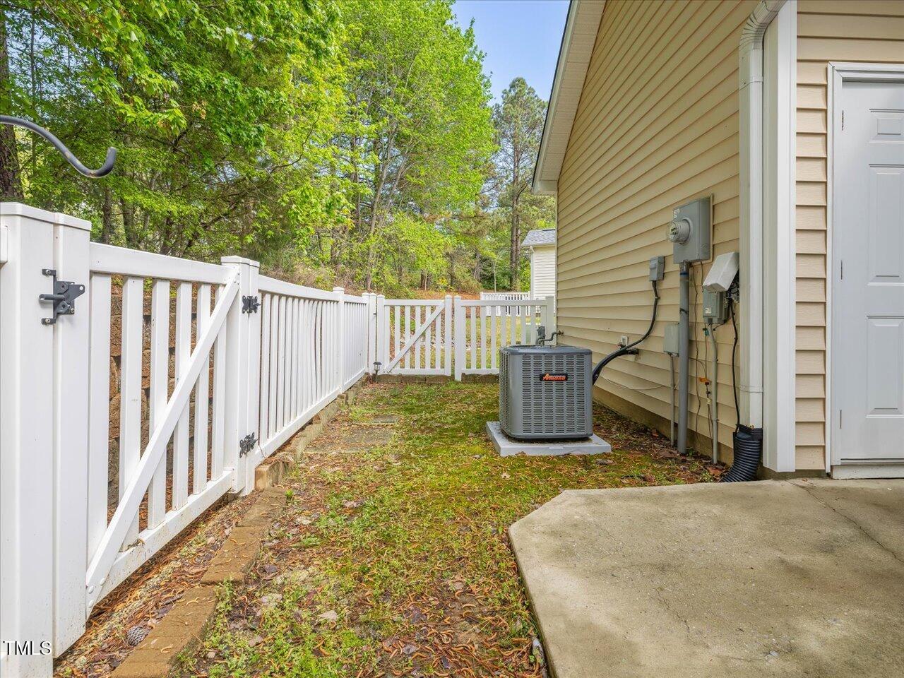 522 Auburn Square Drive Durham, NC 27713 - Photo 32 of 47 a view of a balcony with chair and floor to ceiling window