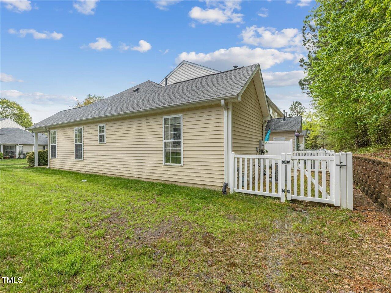 522 Auburn Square Drive Durham, NC 27713 - Photo 34 of 47 a front view of a house with garden