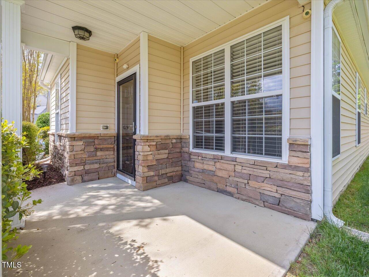 522 Auburn Square Drive Durham, NC 27713 - Photo 4 of 47 a view of front door with wooden door