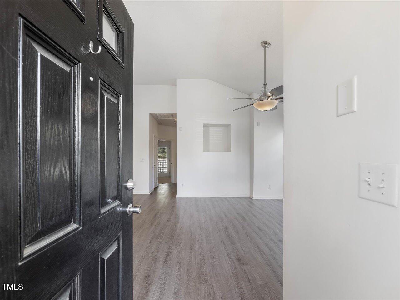 522 Auburn Square Drive Durham, NC 27713 - Photo 5 of 47 a view of a hallway with wooden floor