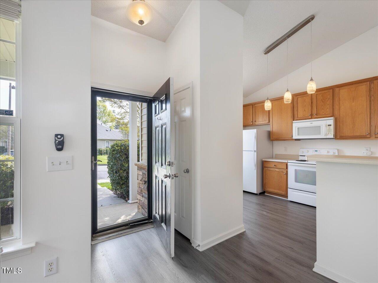 522 Auburn Square Drive Durham, NC 27713 - Photo 6 of 47 a view of a kitchen cabinets and wooden floor