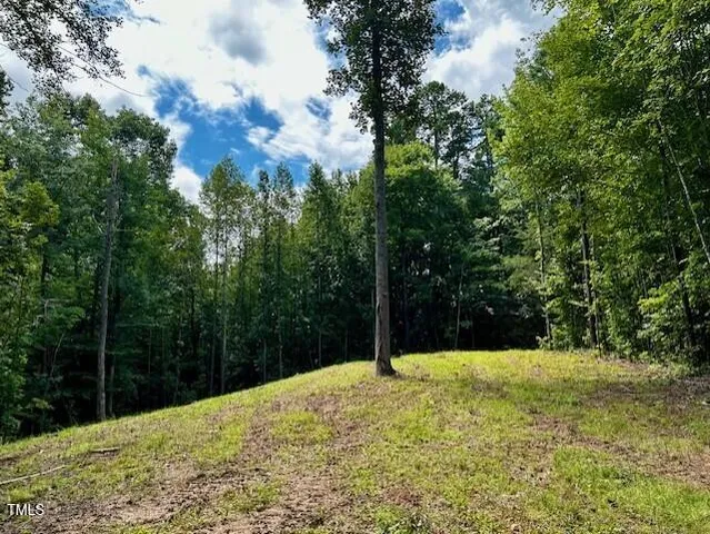 a view of outside space and a lake view
