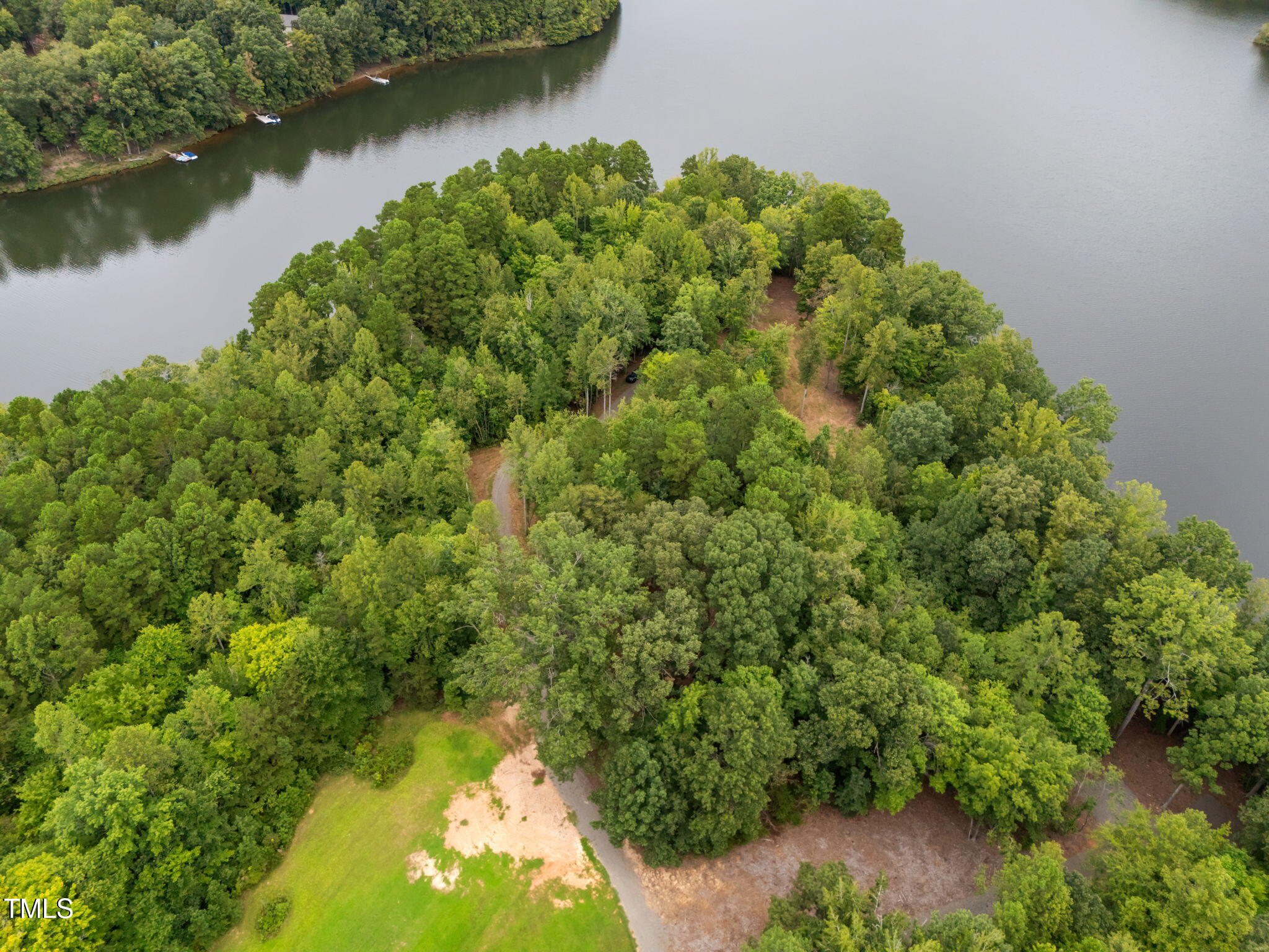 Lot 3 Grapevine Drive Roxboro, NC 27574 - Photo 9 of 17 a backyard of a house with a yard and outdoor seating