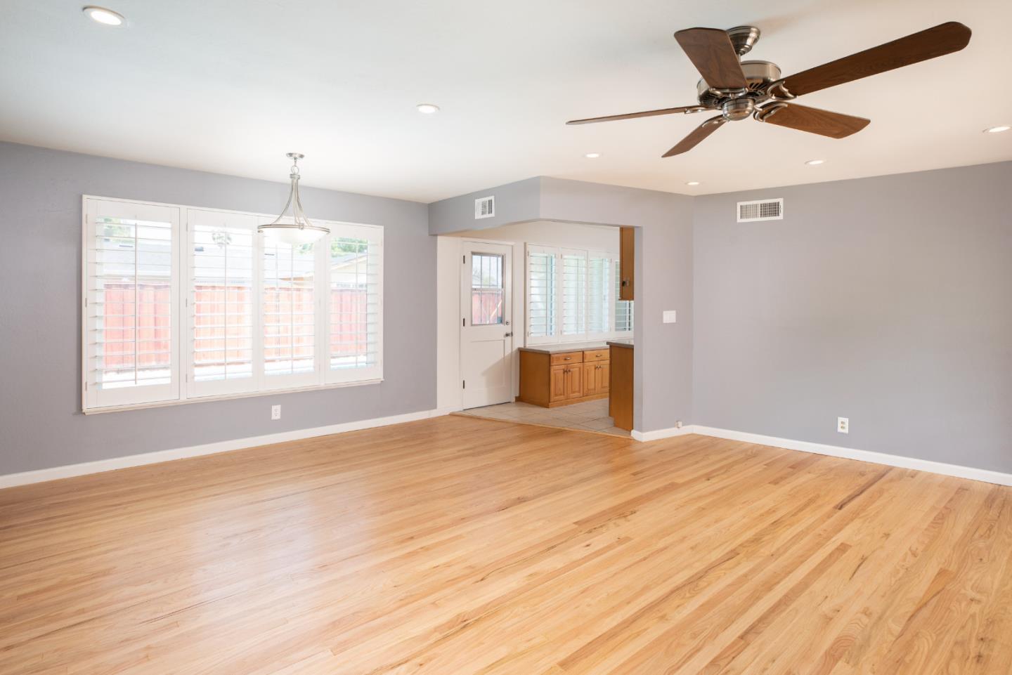 1937 Adelaide Way San Jose, CA 95124 - Photo 7 of 33 a view of an empty room with window and a kitchen