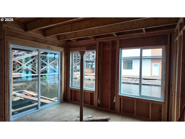 a black and white photo of a living room