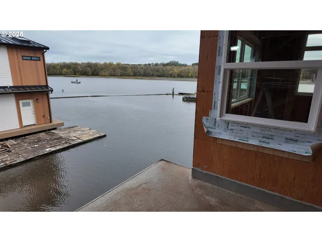 a kitchen view with furniture and outdoor view
