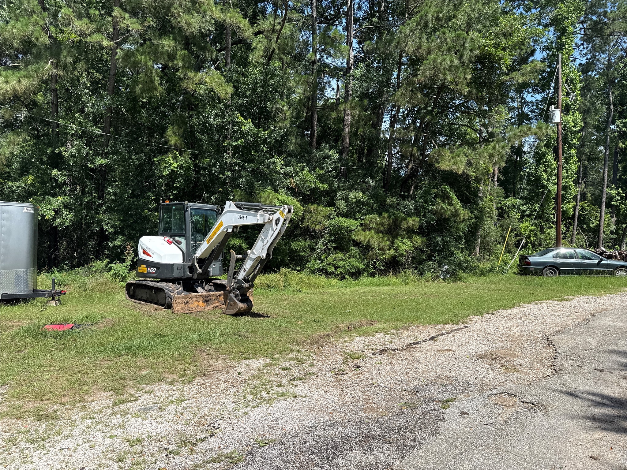 11236 Memory Lane Cleveland, TX 77328 - Photo 2 of 3 a view of a house with backyard and sitting area
