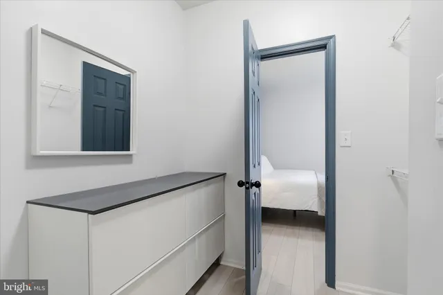 a view of a hallway with washer and dryer