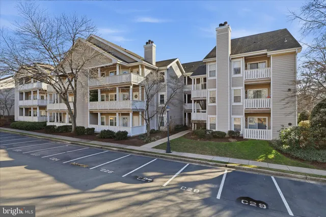 a front view of a house with garage