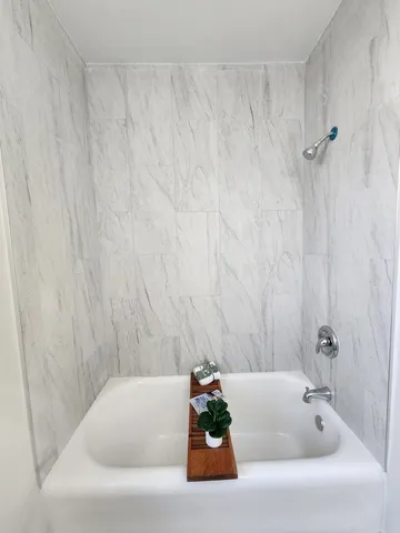 a bathroom with a bathtub