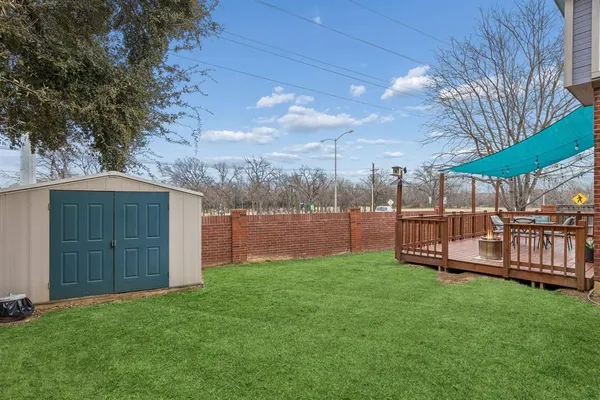 a view of a backyard with a garden