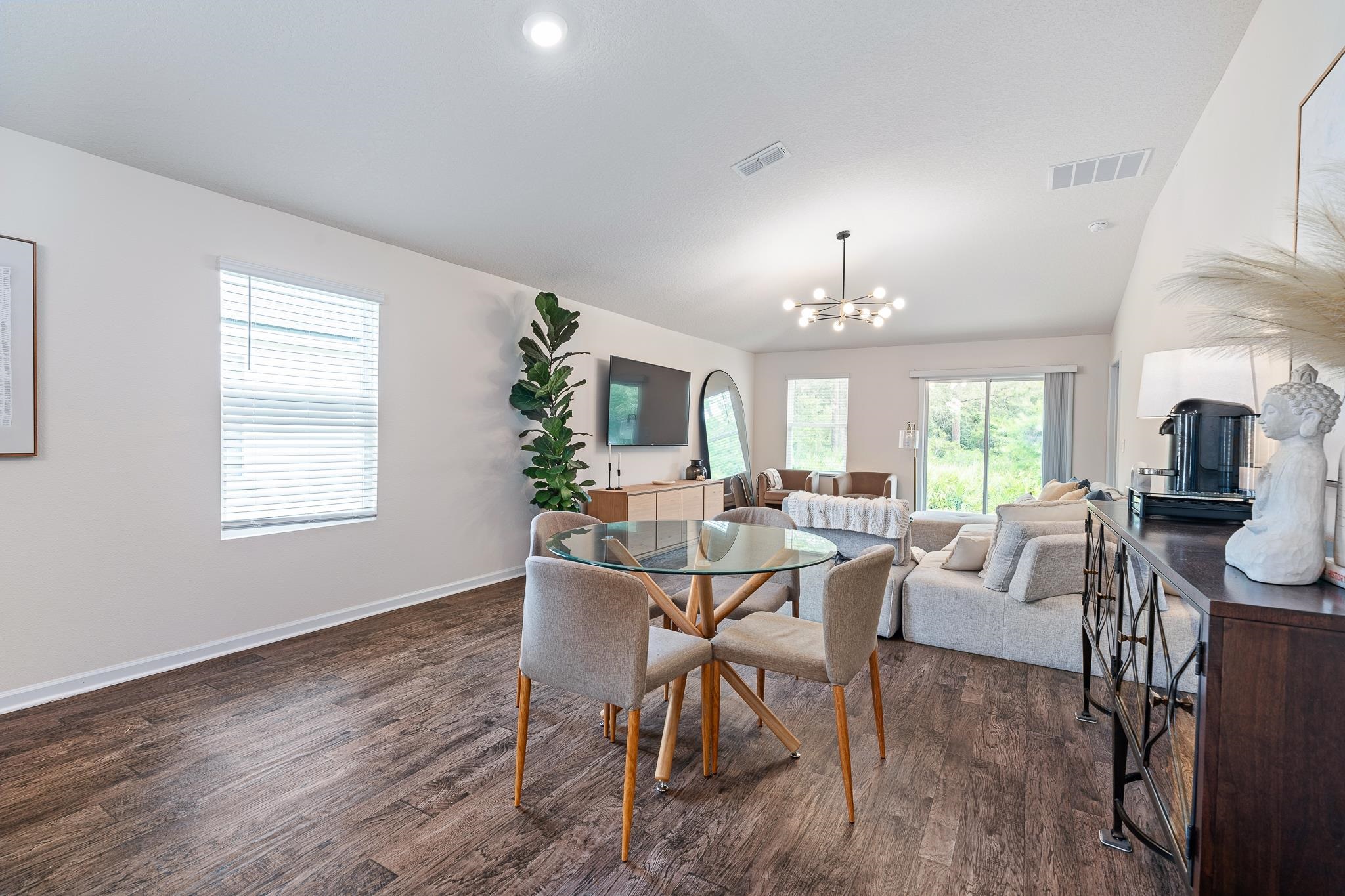 147 Logrono Court St. Augustine, FL 32084 - Photo 12 of 50 a view of a dining room with furniture window and wooden floor