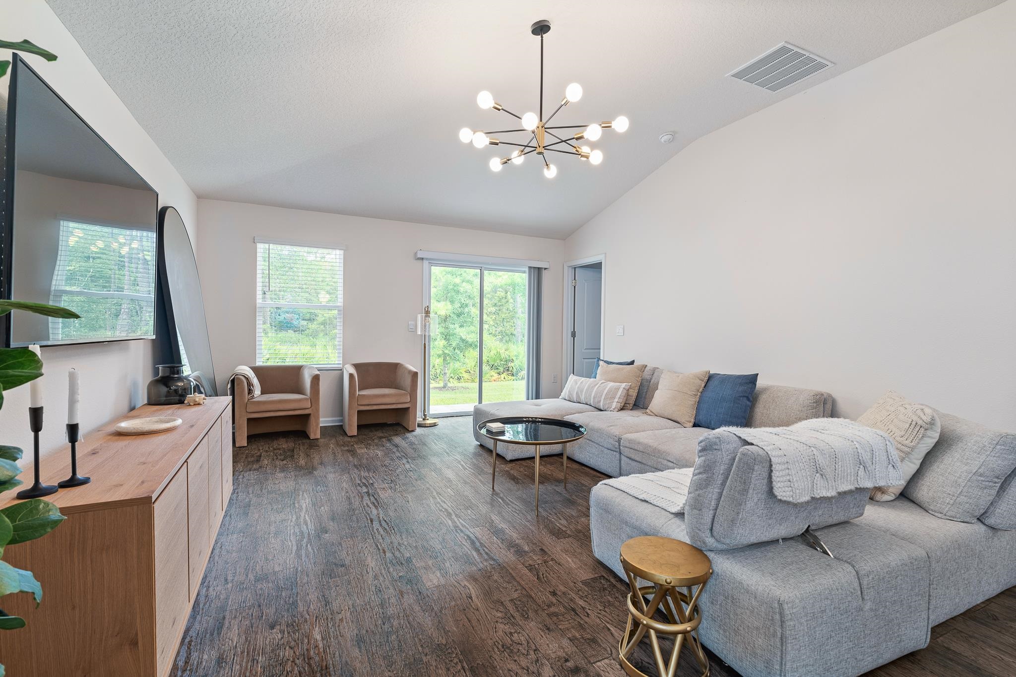 147 Logrono Court St. Augustine, FL 32084 - Photo 14 of 50 a living room with furniture and large windows