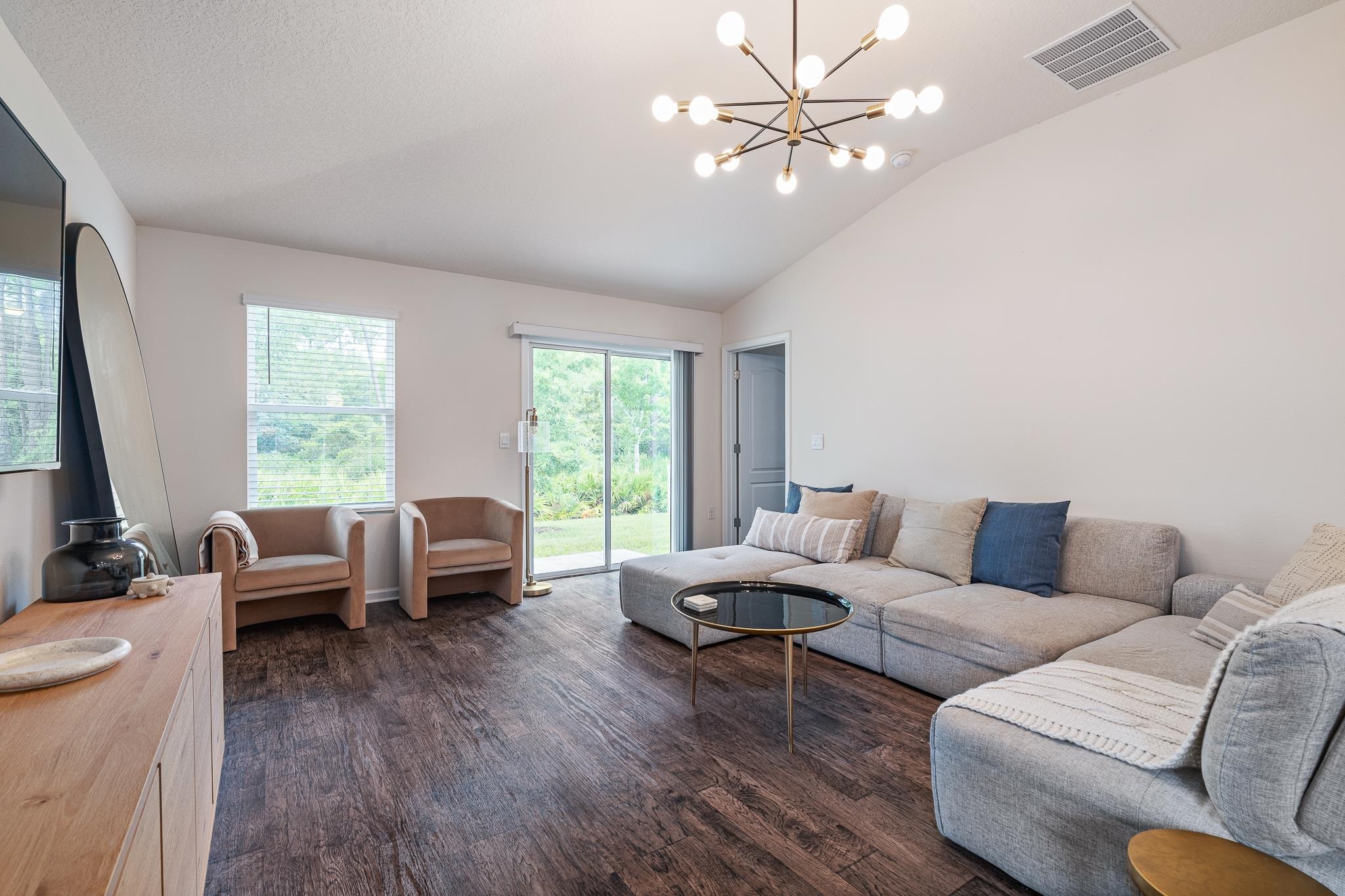 147 Logrono Court St. Augustine, FL 32084 - Photo 15 of 50 a living room with furniture and a large window