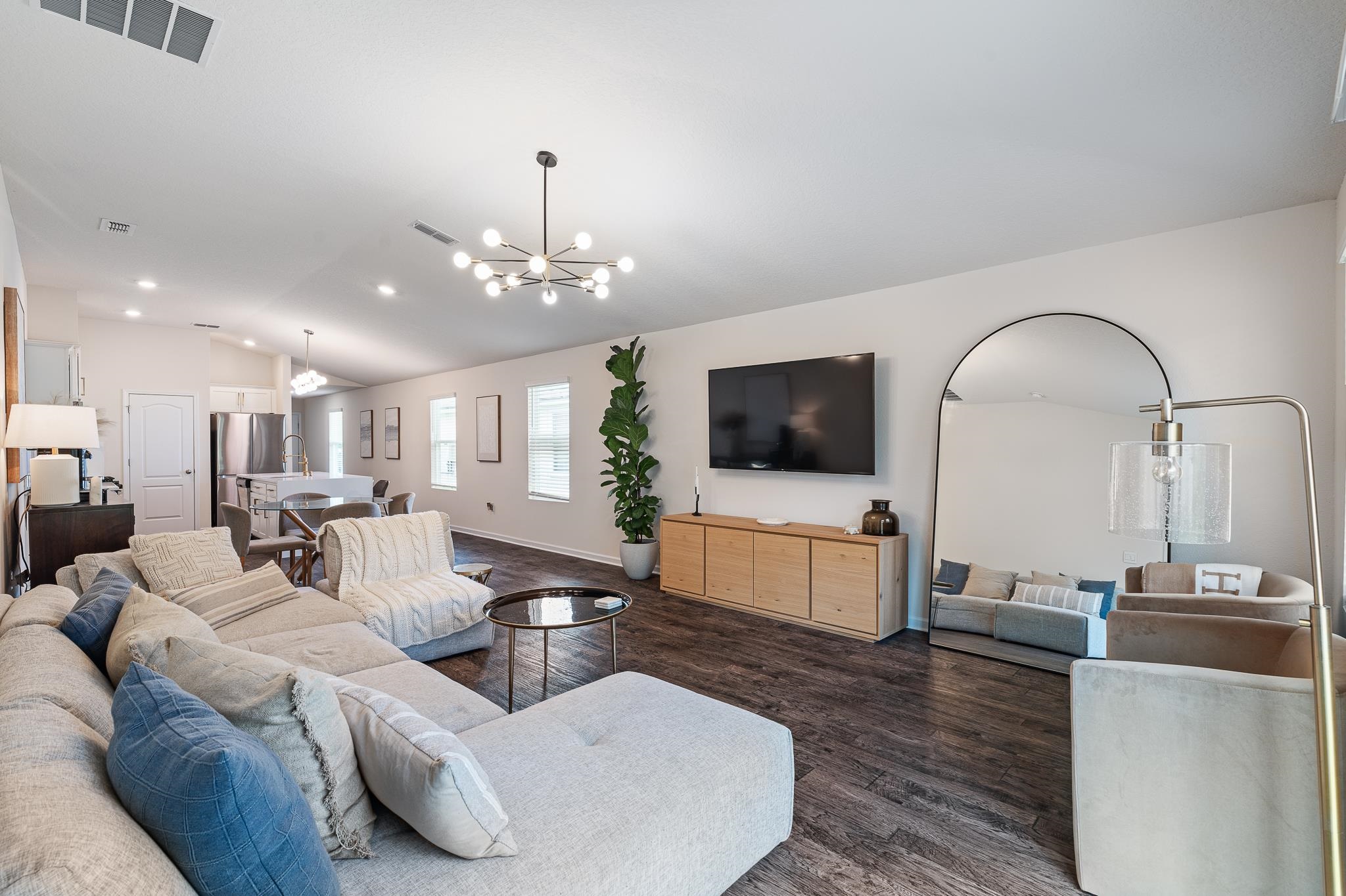 147 Logrono Court St. Augustine, FL 32084 - Photo 16 of 50 a living room with fireplace furniture and a flat screen tv