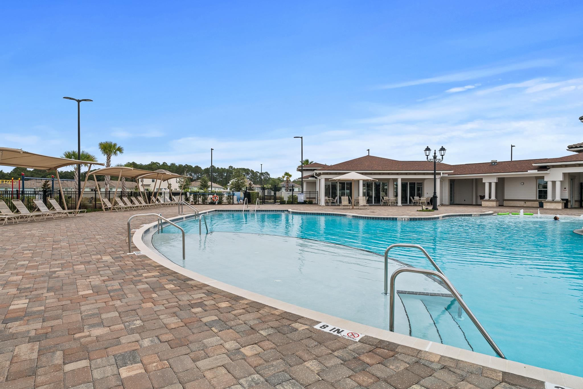 147 Logrono Court St. Augustine, FL 32084 - Photo 28 of 50 a view of a swimming pool with a lake view