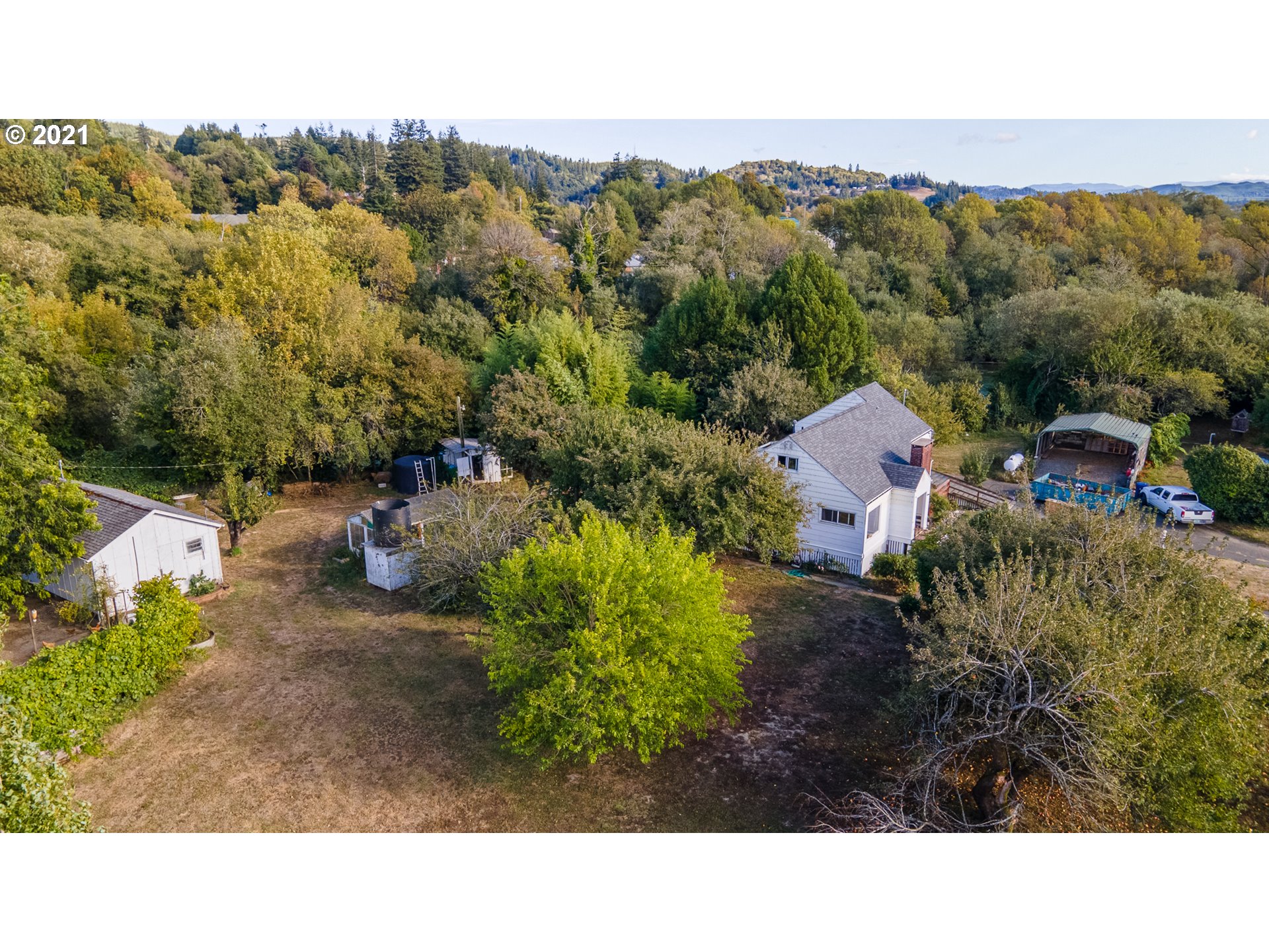 55561 Fishtrap Road Coquille, OR 97423 - Photo 3 of 31 a outdoor view having outdoor seating