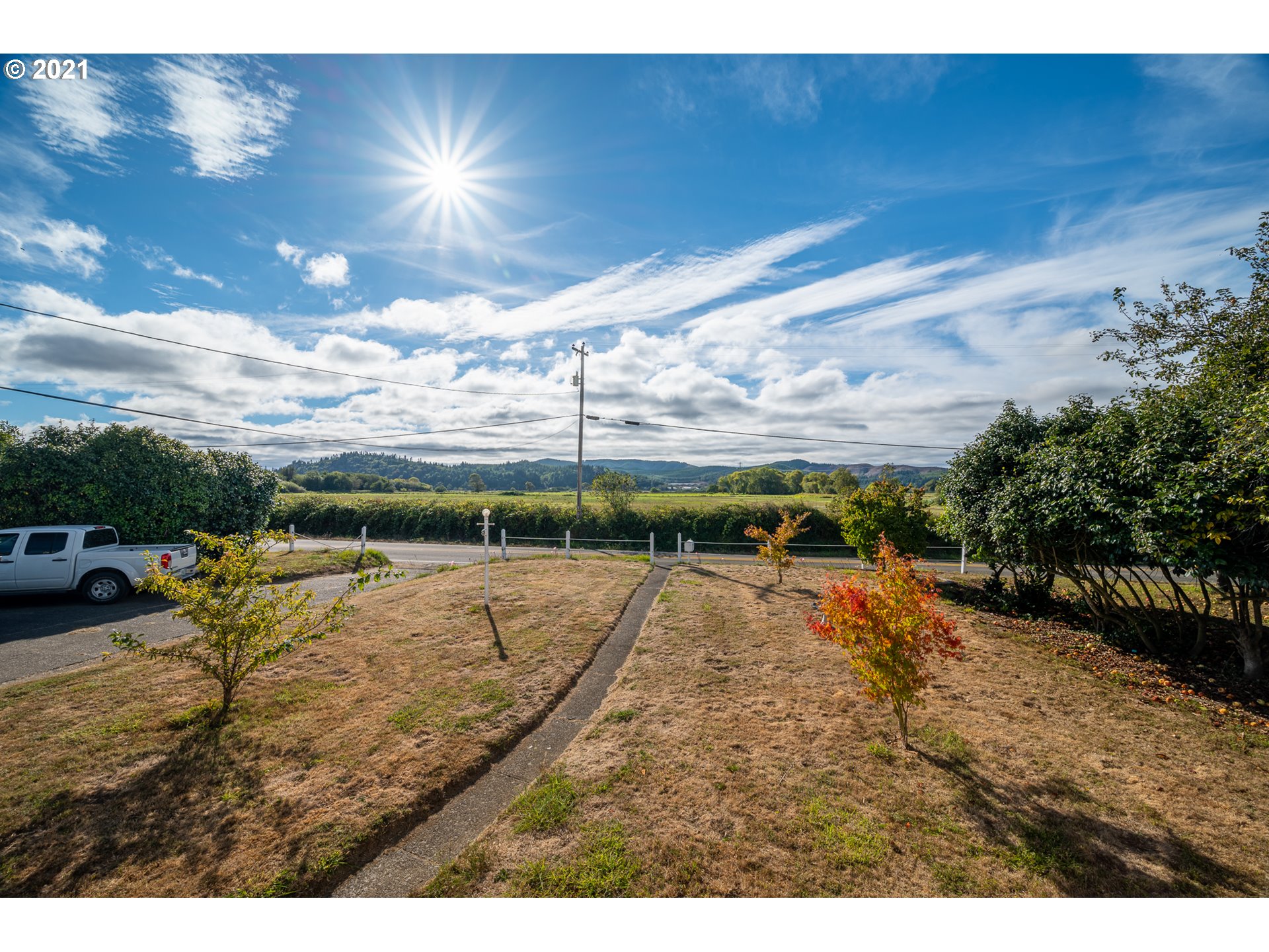 55561 Fishtrap Road Coquille, OR 97423 - Photo 5 of 31 a view of a swimming pool with an outdoor space and seating area