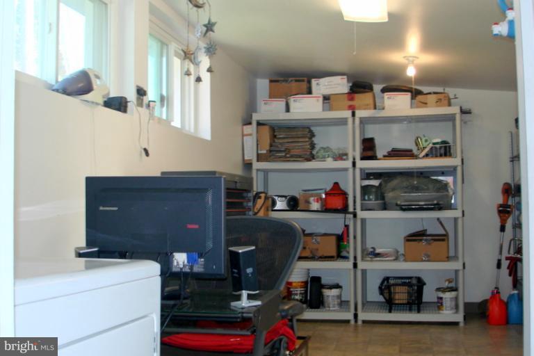 8803 Riggs Road Hyattsville, MD 20783 - Photo 17 of 24 a room with storage and utility