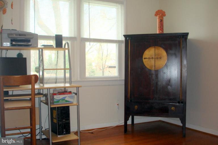 8803 Riggs Road Hyattsville, MD 20783 - Photo 23 of 24 a room with storage and window