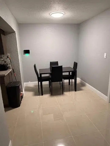 a view of a livingroom with furniture