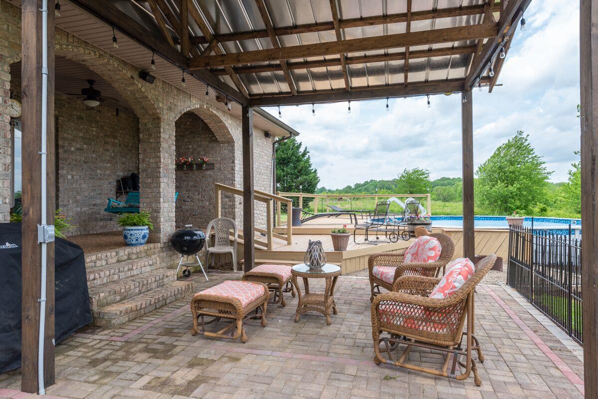 3454 Catholic Church Road Cedar Hill, TN 37032 - Photo 24 of 30 The Covered Porch is an added plus and provides shelter for your favorite barbecues.