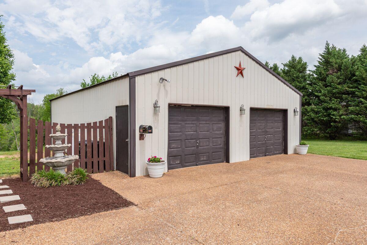 3454 Catholic Church Road Cedar Hill, TN 37032 - Photo 26 of 30 This 30x40 Detached Garage will accommodate 4 cars and lots of adult toys.