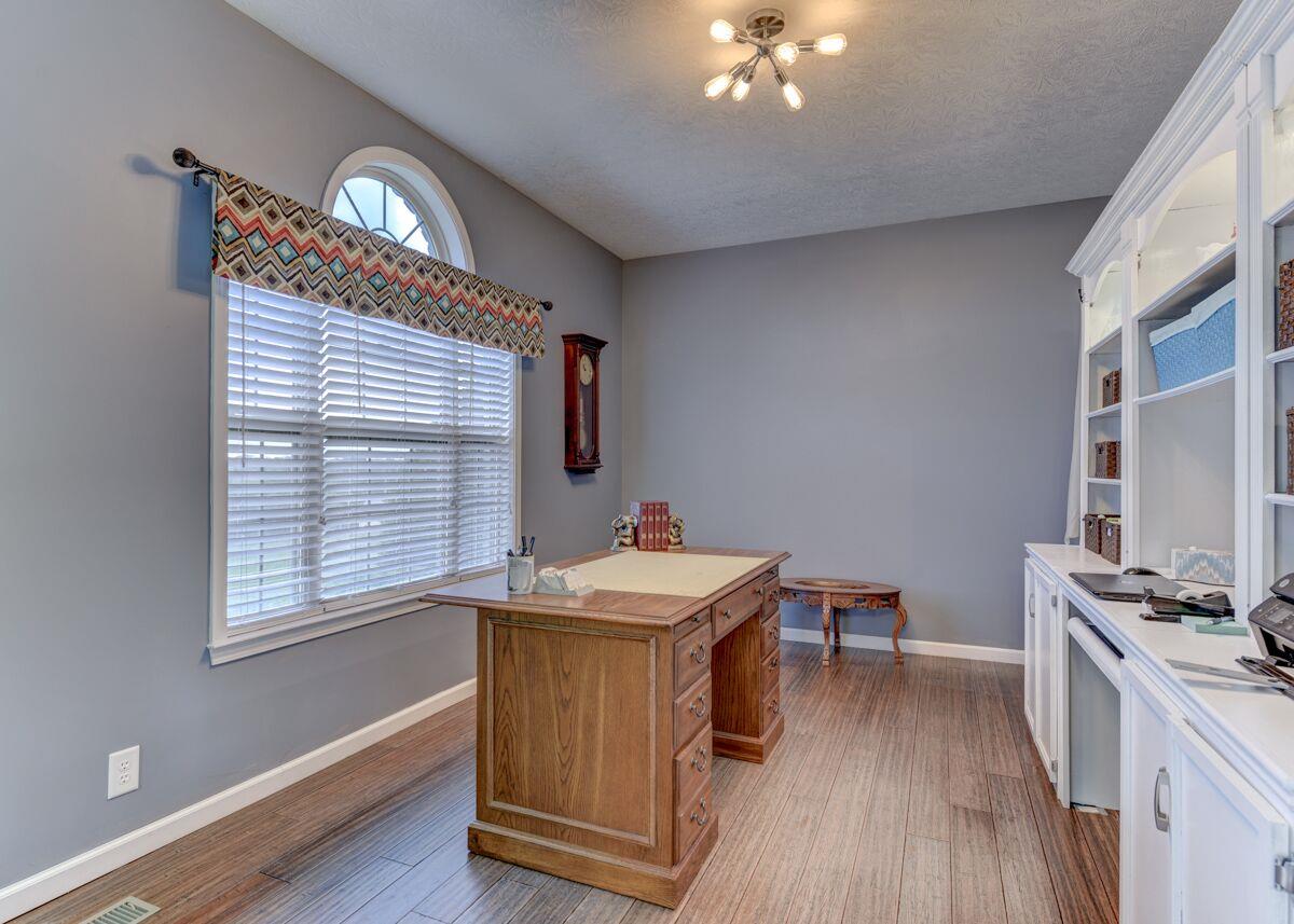 3454 Catholic Church Road Cedar Hill, TN 37032 - Photo 8 of 30 This multi purpose room makes a great home Office or Sewing Room. The room offers Hardwood Floors.