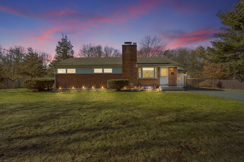 1247 Bay Road Sharon, MA 02067 - Photo 1 of 41 a front view of a house with garden