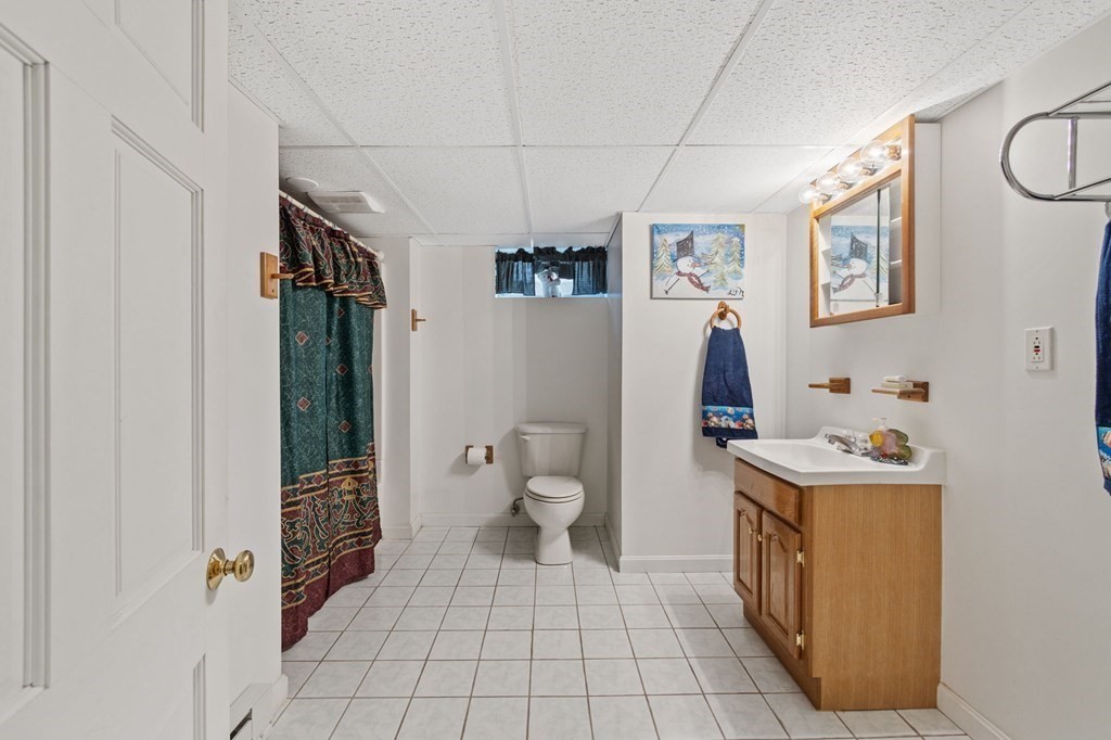1247 Bay Road Sharon, MA 02067 - Photo 21 of 41 a view of bathroom with a toilet sink and mirror