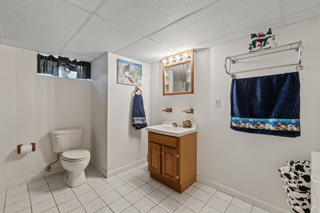 1247 Bay Road Sharon, MA 02067 - Photo 22 of 41 a view of bathroom with a toilet a sink and a mirror