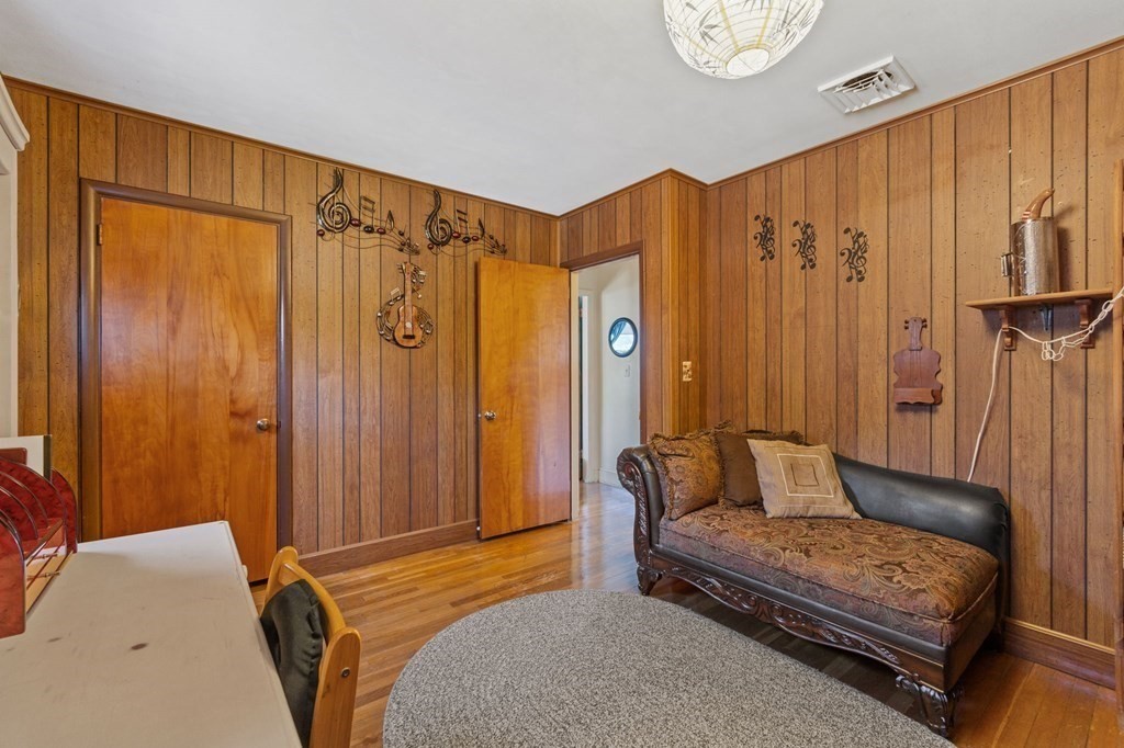 1247 Bay Road Sharon, MA 02067 - Photo 26 of 41 a bedroom with a bed and a curtain