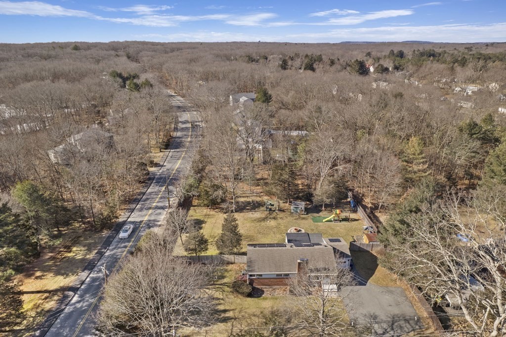 1247 Bay Road Sharon, MA 02067 - Photo 3 of 41 an aerial view of a house with a yard
