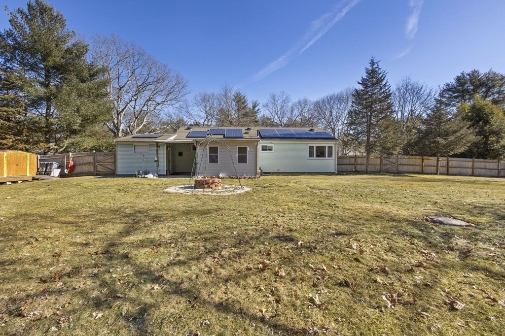 1247 Bay Road Sharon, MA 02067 - Photo 38 of 41 a view of a house with a yard