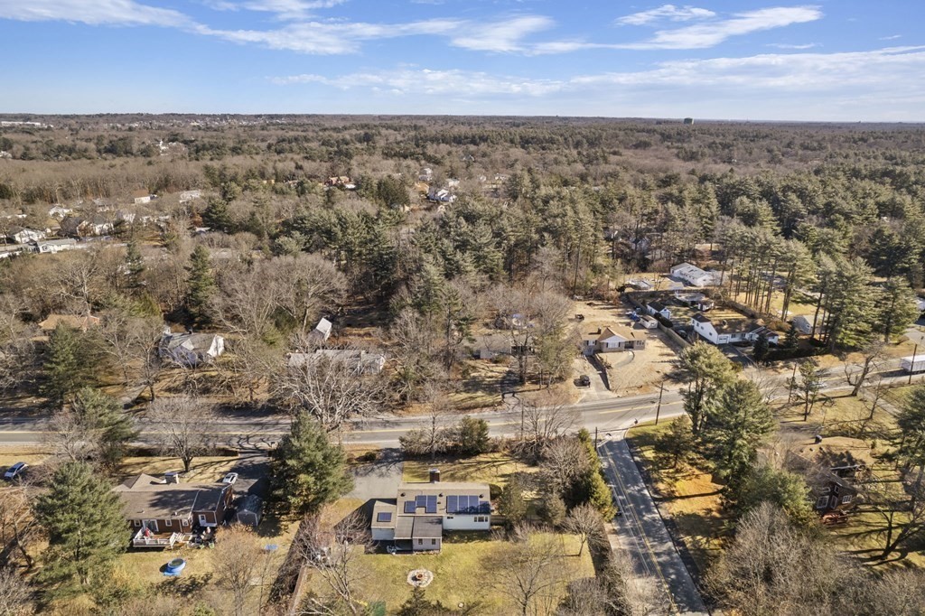 1247 Bay Road Sharon, MA 02067 - Photo 4 of 41 an aerial view of residential building with parking space