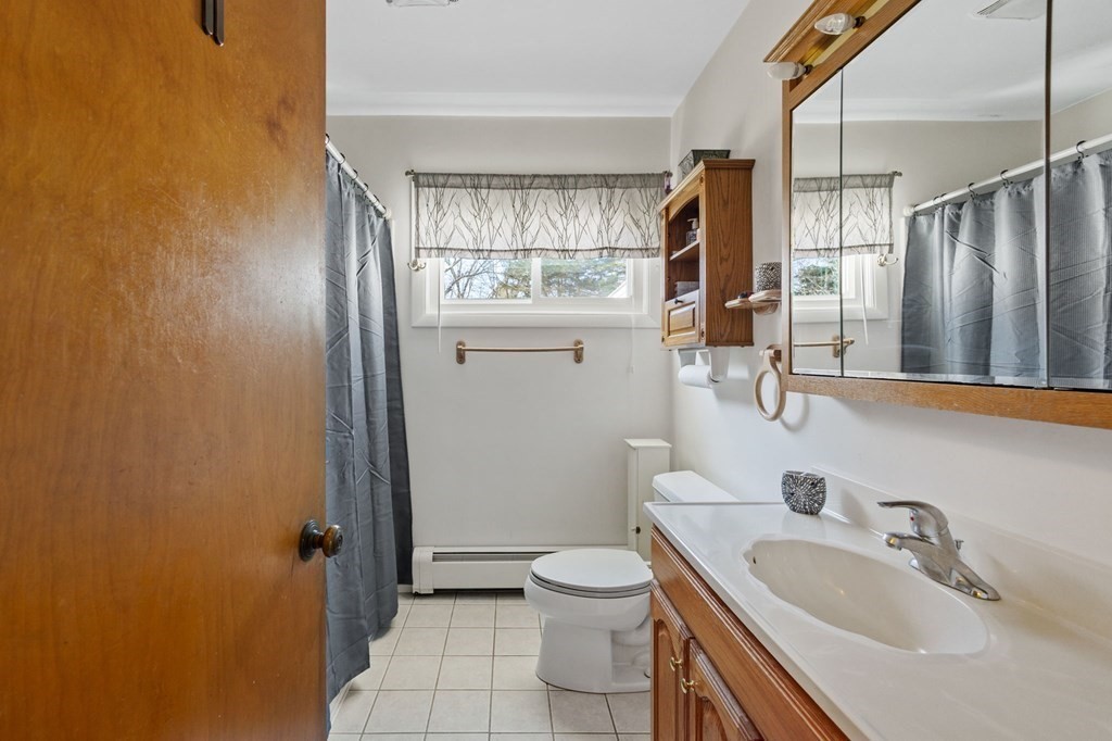 1247 Bay Road Sharon, MA 02067 - Photo 41 of 41 a bathroom with a sink toilet and shower