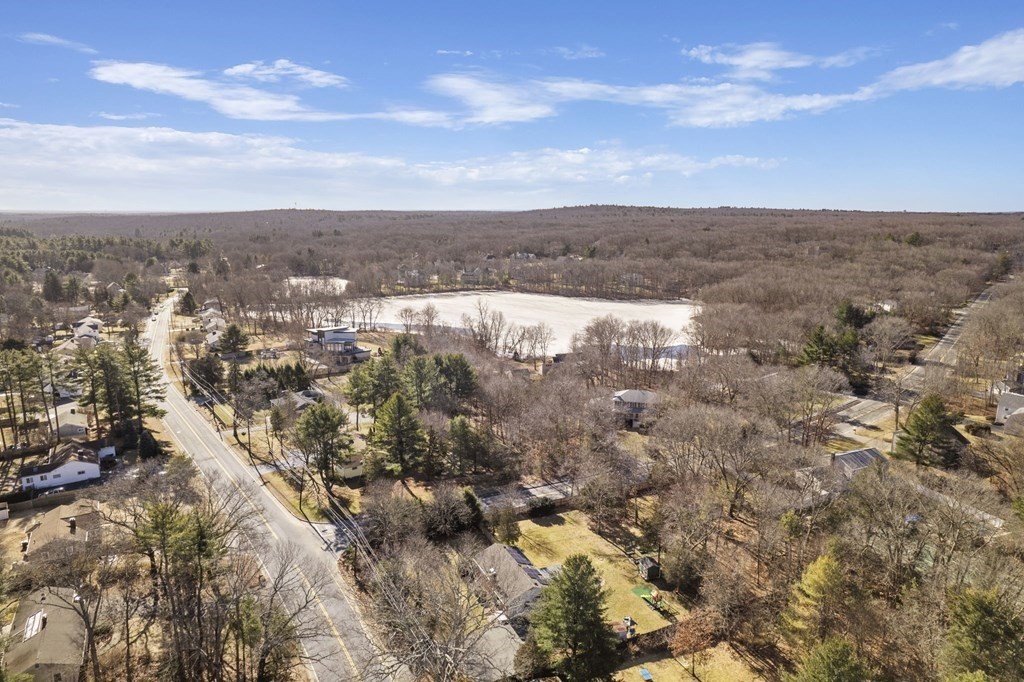 1247 Bay Road Sharon, MA 02067 - Photo 5 of 41 an aerial view of house with yard and mountain view in back