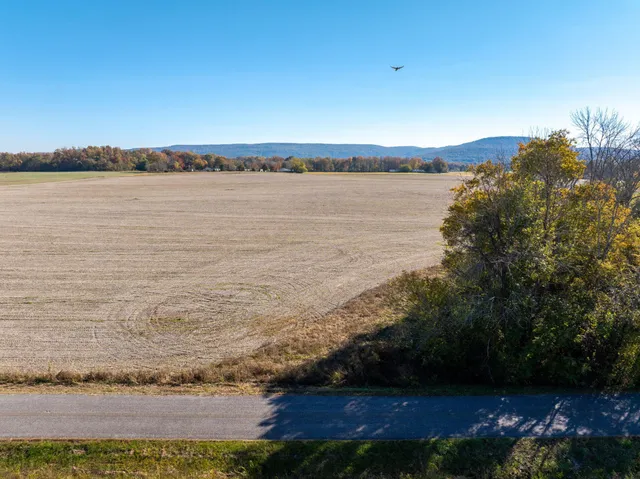 an aerial view of beach and city
