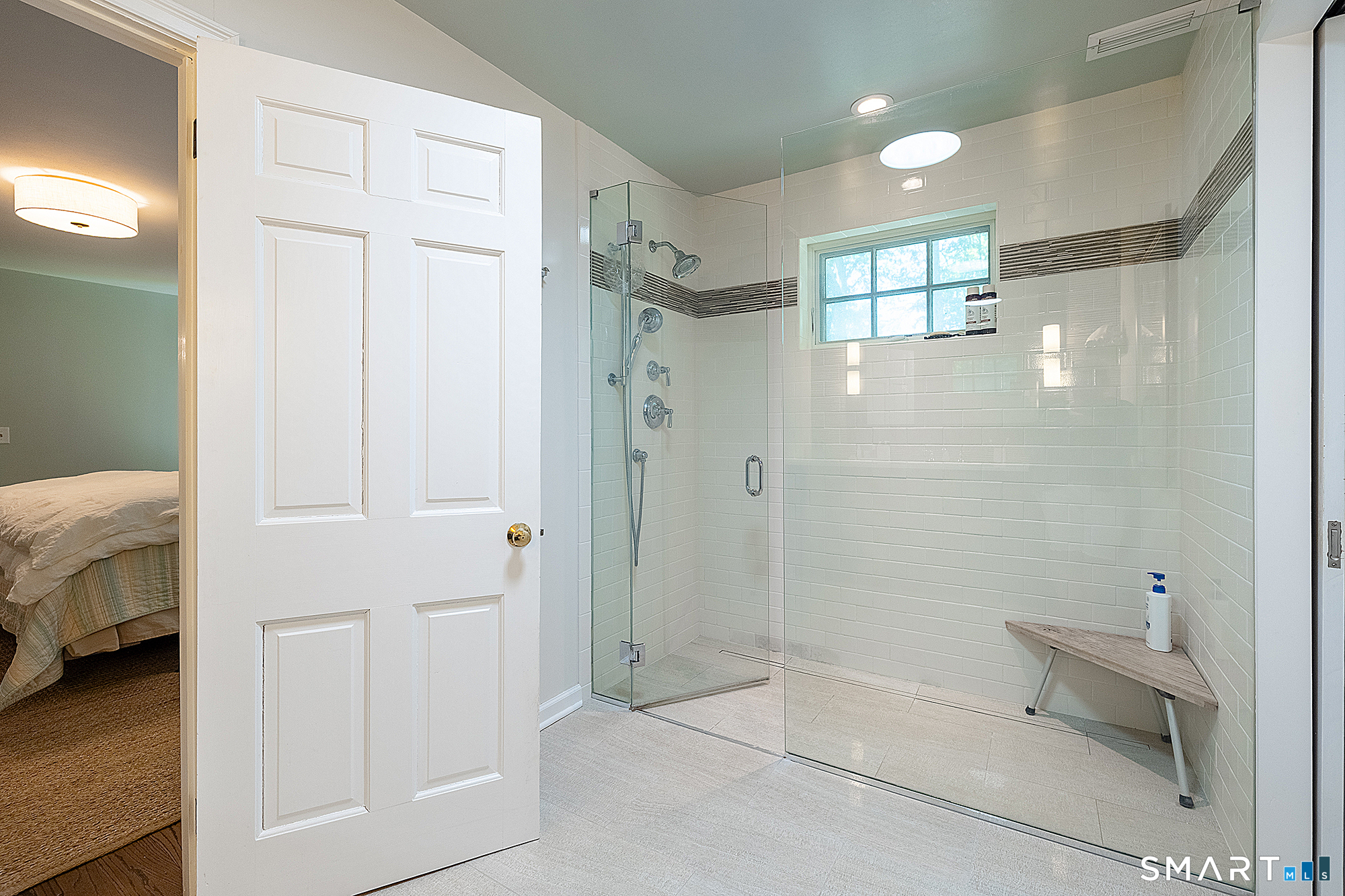 33 Hunter Lane Ridgefield, CT 06877 - Photo 23 of 39 a bathroom with a shower and a toilet