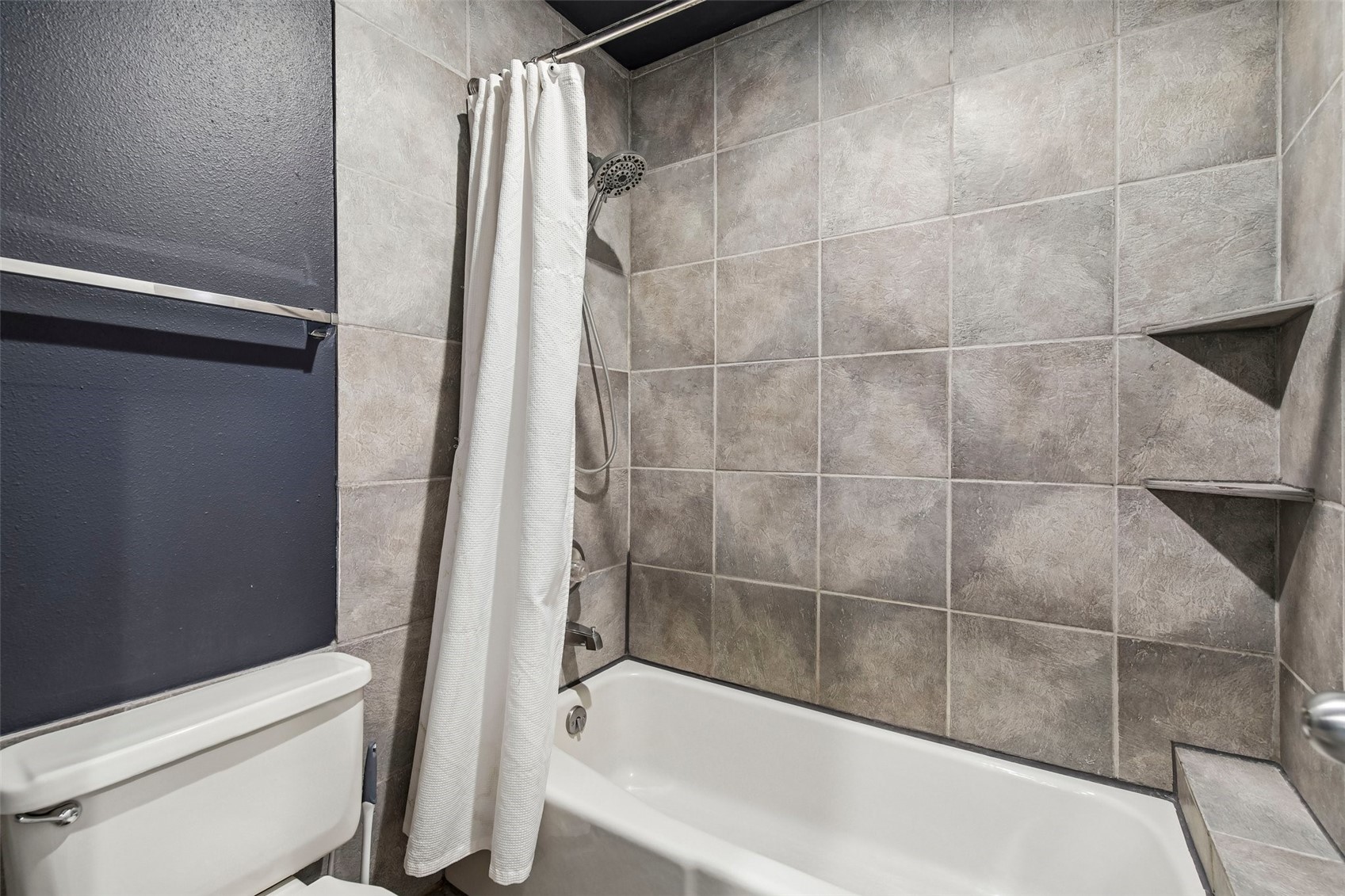 1211 West Keystone Road, Unit 2747 Keystone, CO 80435 - Photo 13 of 31 a bathroom with a bathtub and toilet