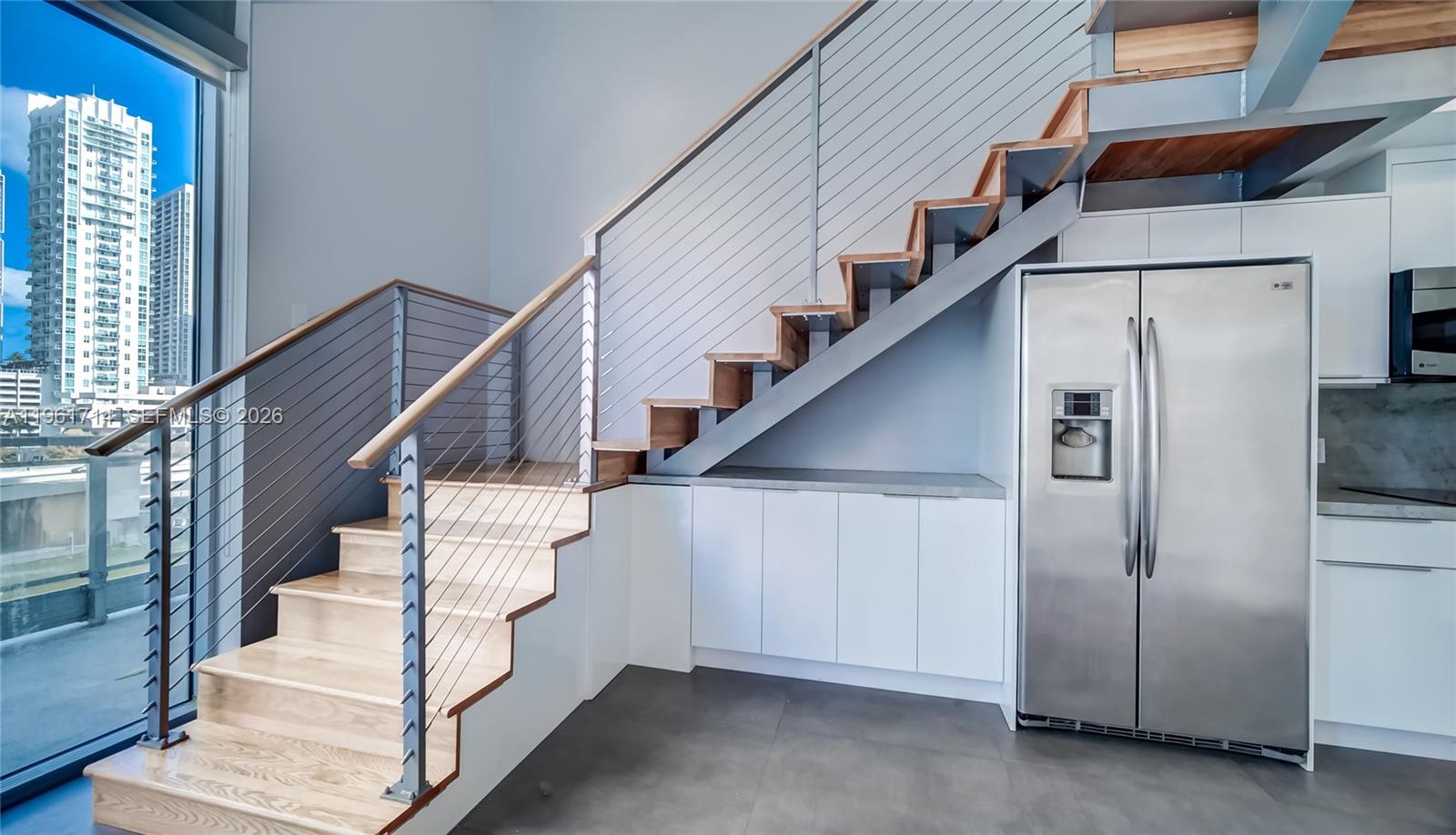 90 Southwest 3rd Street, Unit TH706 Miami, FL 33130 - Photo 13 of 37 a view of entryway and hall with wooden floor