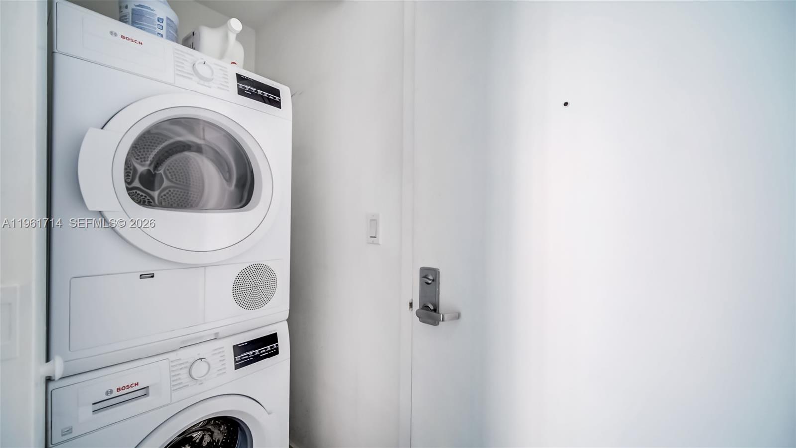 90 Southwest 3rd Street, Unit TH706 Miami, FL 33130 - Photo 17 of 37 a view of entryway with washer and dryer