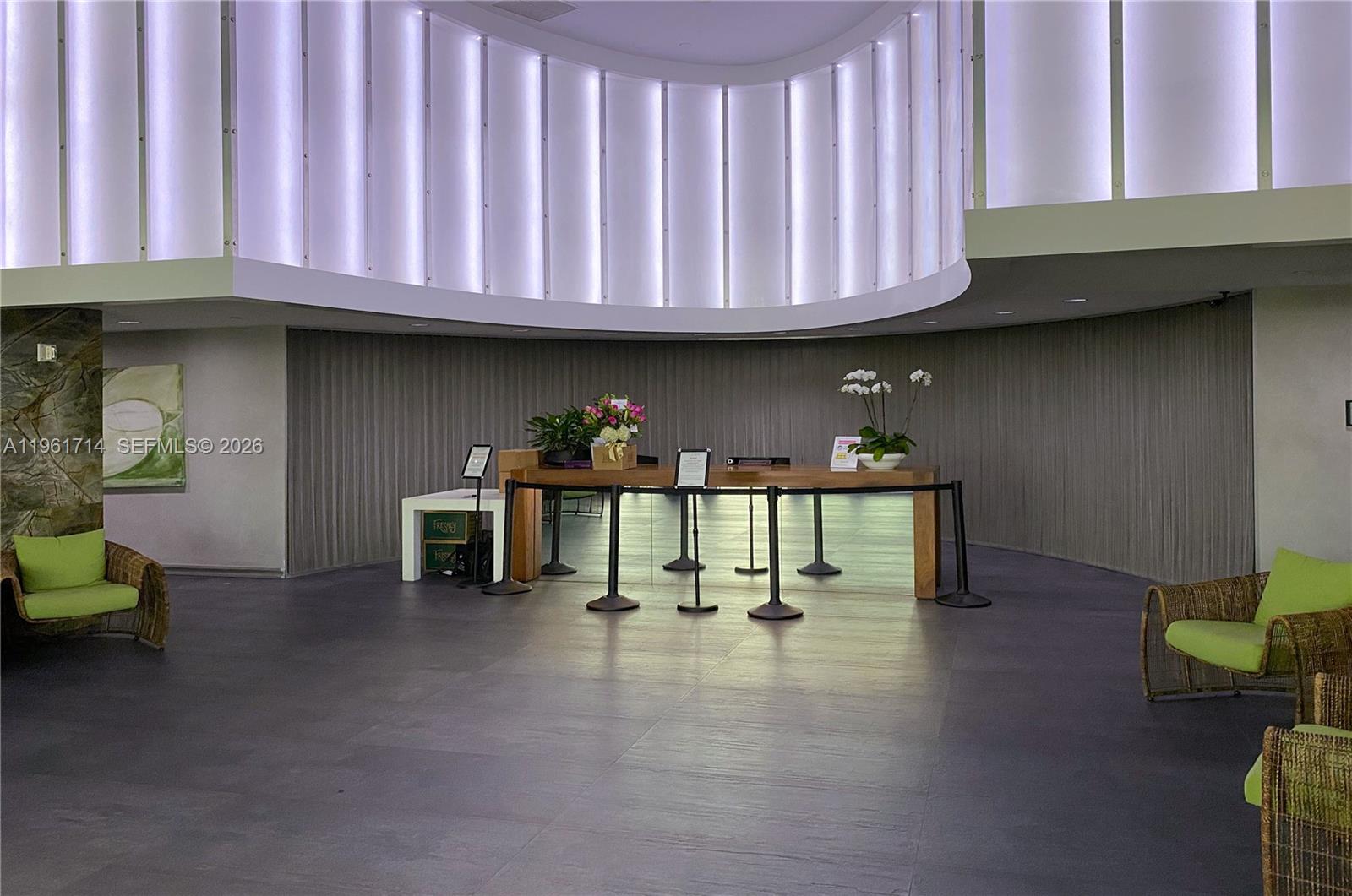 90 Southwest 3rd Street, Unit TH706 Miami, FL 33130 - Photo 35 of 37 a view of a chairs and table in the back yard of a building